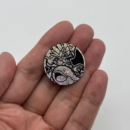 In hand, from Pokémon Coin Fan, full size