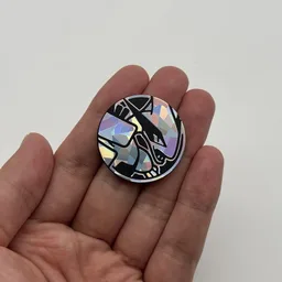 In hand, from Pokémon Coin Fan, full size