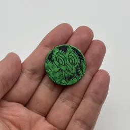 In hand, from Pokémon Coin Fan, full size