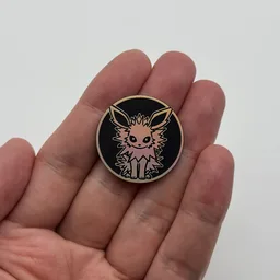 In hand, from Pokémon Coin Fan, full size