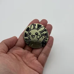 In hand, from Pokémon Coin Fan, full size