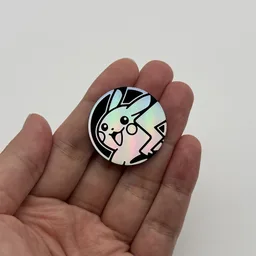 In hand, from Pokémon Coin Fan, full size