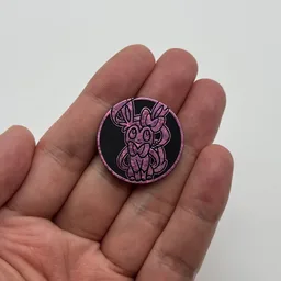 In hand, from Pokémon Coin Fan, full size