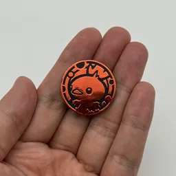 In hand, from Pokémon Coin Fan, full size