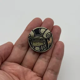 In hand, from Pokémon Coin Fan, full size