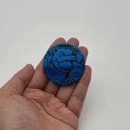 In hand, from Pokémon Coin Fan, full size