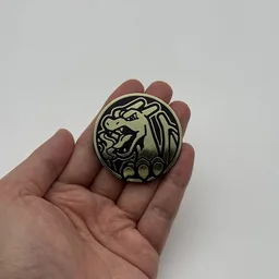 In hand, from Pokémon Coin Fan, full size