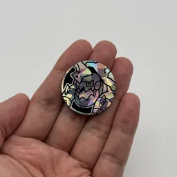 In hand, from Pokémon Coin Fan, full size