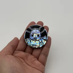 In hand, from Pokémon Coin Fan, full size