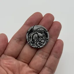 In hand, from Pokémon Coin Fan, full size