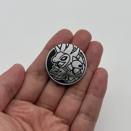 In hand, from Pokémon Coin Fan, full size