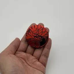 In hand, from Pokémon Coin Fan, full size