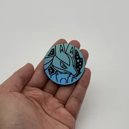In hand, from Pokémon Coin Fan, full size