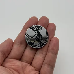 In hand, from Pokémon Coin Fan, full size