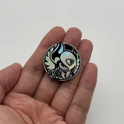 In hand, from Pokémon Coin Fan, full size