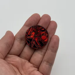 In hand, from Pokémon Coin Fan, full size