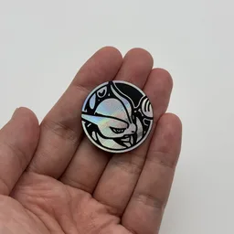 In hand, from Pokémon Coin Fan, full size