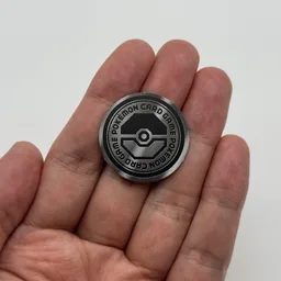 In hand, from Pokémon Coin Fan, full size