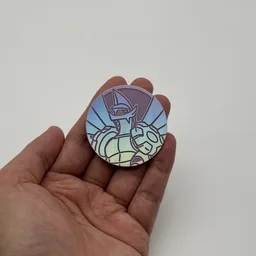 In hand, from Pokémon Coin Fan, full size