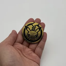 In hand, from Pokémon Coin Fan, full size