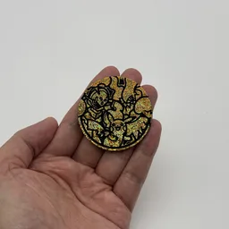 In hand, from Pokémon Coin Fan, full size