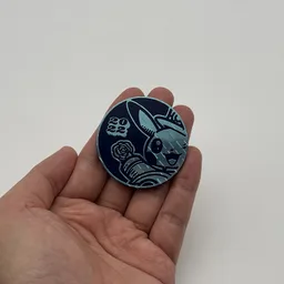 In hand, from Pokémon Coin Fan, full size