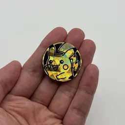 In hand, from Pokémon Coin Fan, full size