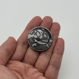 In hand, from Pokémon Coin Fan, full size