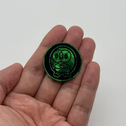 In hand, from Pokémon Coin Fan, full size