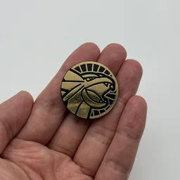 In hand, from Pokémon Coin Fan, full size