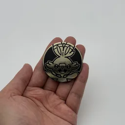 In hand, from Pokémon Coin Fan, full size