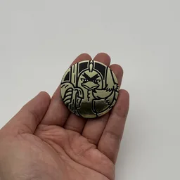 In hand, from Pokémon Coin Fan, full size