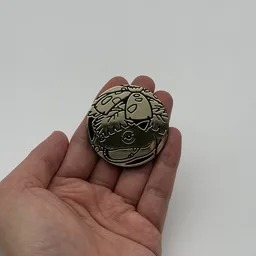 In hand, from Pokémon Coin Fan, full size