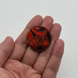 In hand, from Pokémon Coin Fan, full size