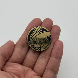 In hand, from Pokémon Coin Fan, full size