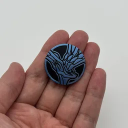 In hand, from Pokémon Coin Fan, full size