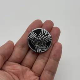 In hand, from Pokémon Coin Fan, full size