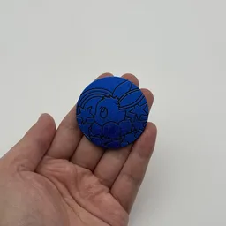 In hand, from Pokémon Coin Fan, full size