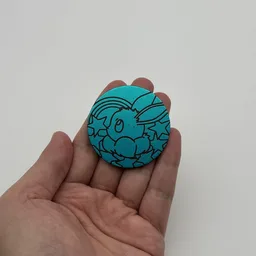 In hand, from Pokémon Coin Fan, full size
