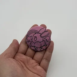 In hand, from Pokémon Coin Fan, full size