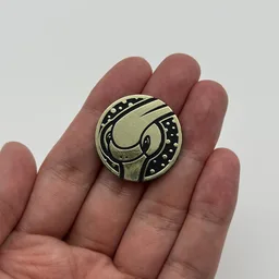 In hand, from Pokémon Coin Fan, full size