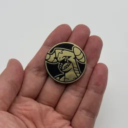 In hand, from Pokémon Coin Fan, full size