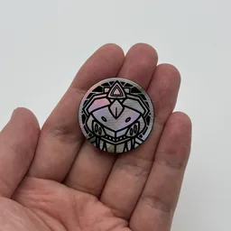 In hand, from Pokémon Coin Fan, full size