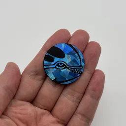 In hand, from Pokémon Coin Fan, full size