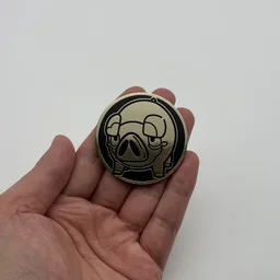 In hand, from Pokémon Coin Fan, full size