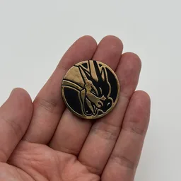 In hand, from Pokémon Coin Fan, full size