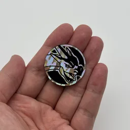 In hand, from Pokémon Coin Fan, full size