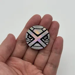In hand, from Pokémon Coin Fan, full size