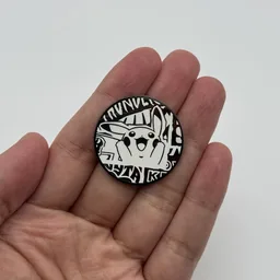 In hand, from Pokémon Coin Fan, full size