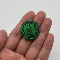 In hand, from Pokémon Coin Fan, full size